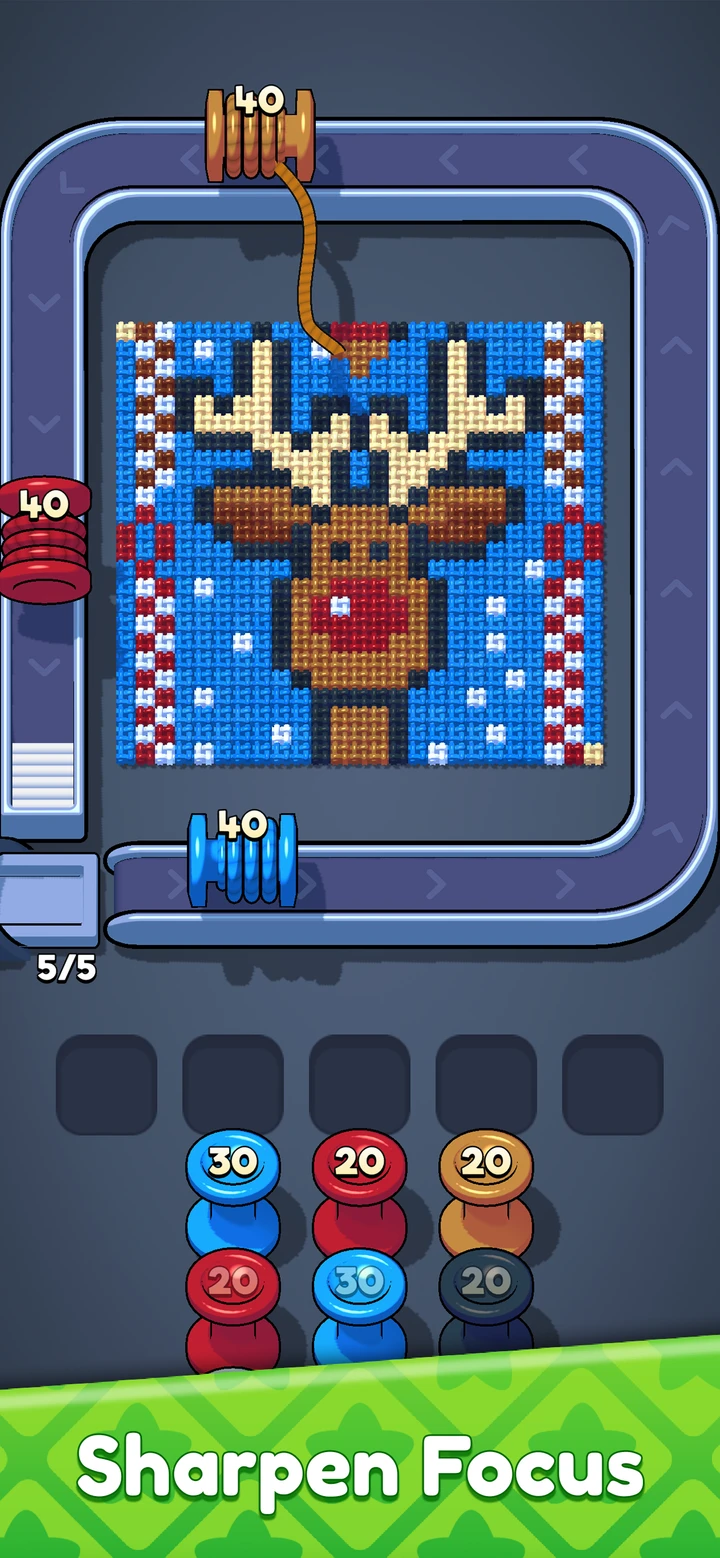 Captura del App Store de Yarnation con un reno tejido sobre fondo azul y bobinas marrones, rojas y azules en la cinta transportadora.